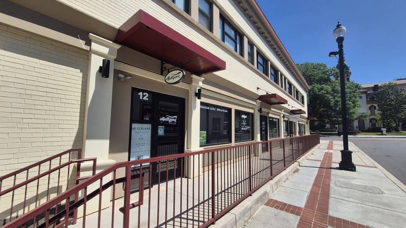 Mulligans storefront Barbrick downtown Concord NC