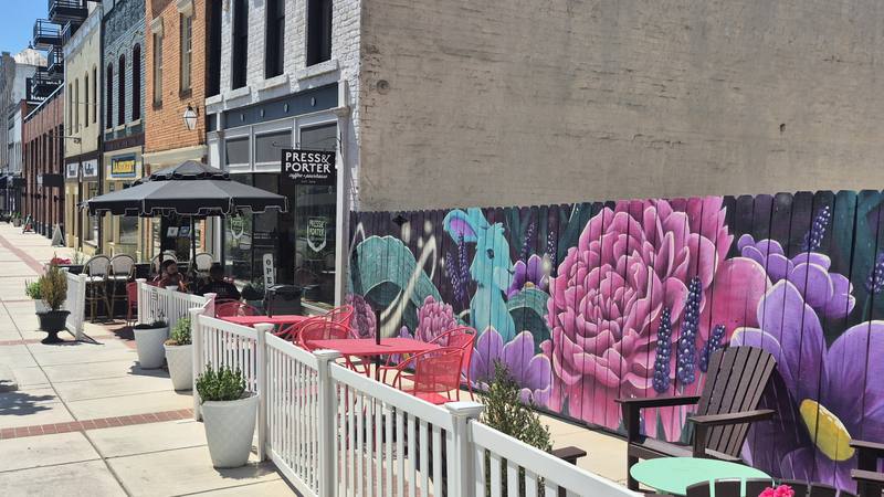 Press & Porter storefront fence mural patio downtown Concord NC