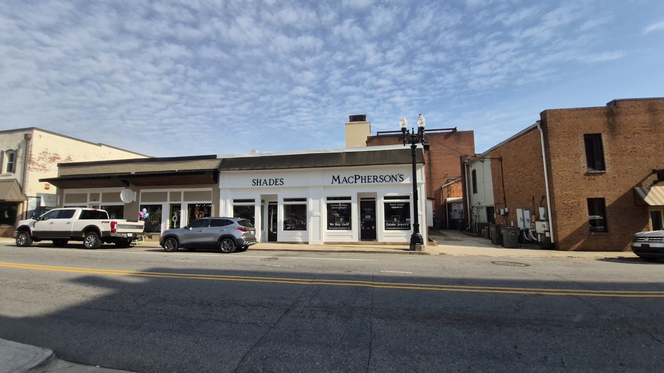 Shades MacPherson's storefront downtown Concord NC